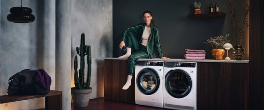Woman sitting on counter with TD and WM